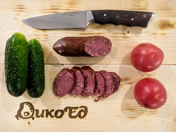 Фото Semi-smoked elk sausage with wild boar